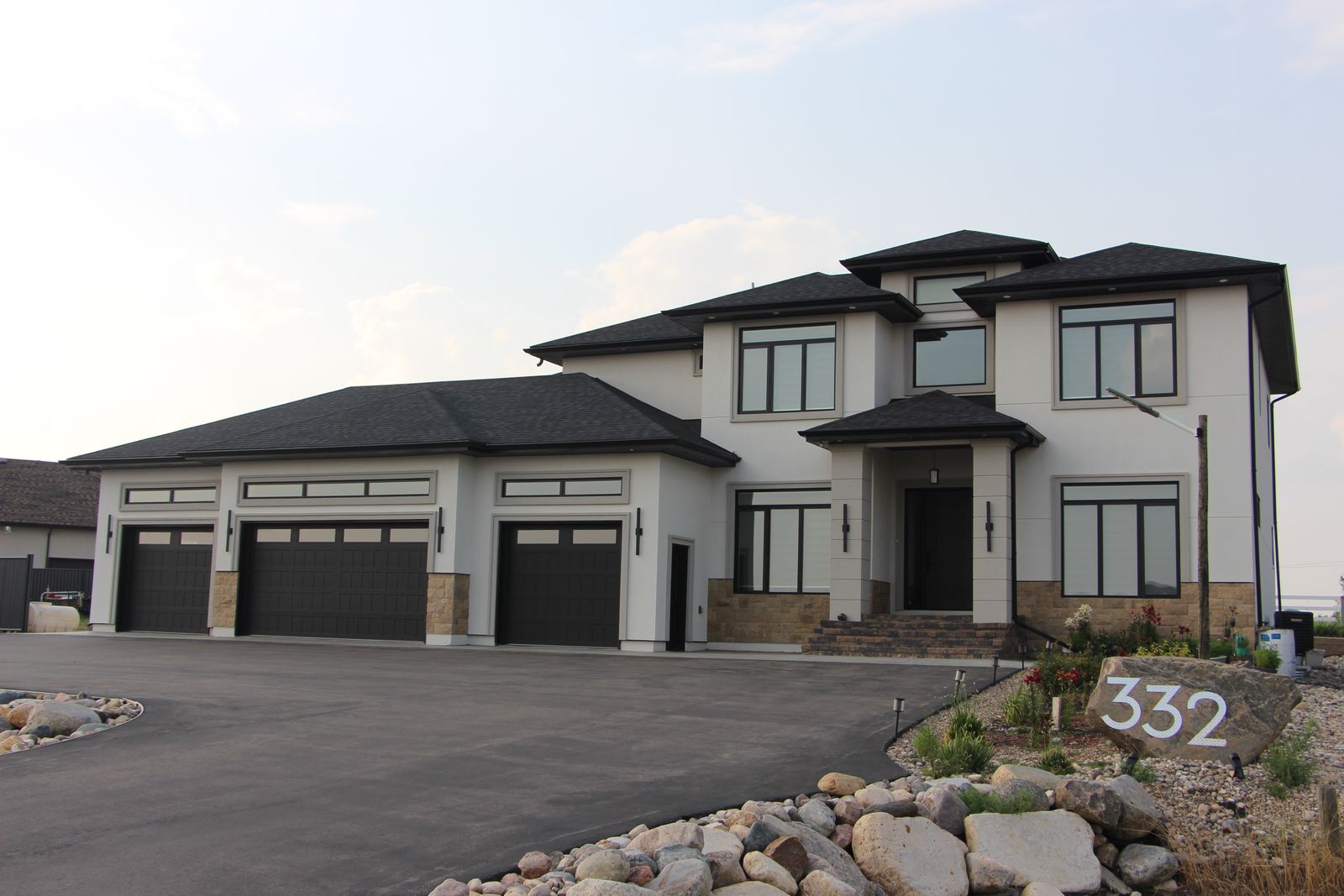 The Embassy custom home — main exterior photo